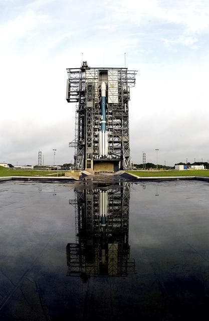 NASA image: KENNEDY SPACE CENTER, FLA. -  On Launch Complex 17-A, Cape Canaveral Air Force Station, the Boeing Delta II rocket and Mars Exploration Rover 2 (MER-A) are ready for the third launch attempt after weather concerns postponed earlier attempts.   MER-A is the first of two rovers being launched to Mars.  When the two rovers arrive at Mars in 2004, they will bounce to airbag-cushioned landings at sites offering a balance of favorable conditions for safe landings and interesting science. The rovers see sharper images, can explore farther and examine rocks better than anything that has ever landed on Mars.  The designated site for MER-A mission is Gusev Crater, which appears to have been a crater lake.  The second rover, MER-B, is scheduled to launch June 25.