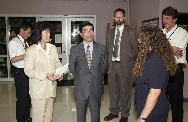 NASA image: KENNEDY SPACE CENTER, FLA. -  In the Space Station Processing Facility, Executive Director of NASDA Koji Yamamoto (center) joins others for a tour.  Mr. Yamamoto is at KSC for a welcome ceremony involving the arrival of the newest Space Station module, the Japanese Experiment Module/pressurized module.