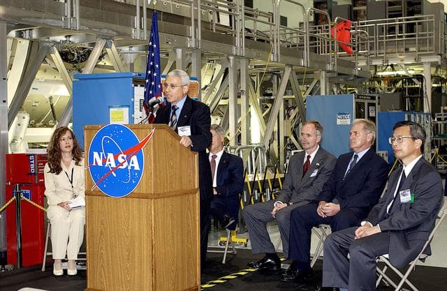 NASA image: KENNEDY SPACE CENTER, FLA. -   Andrea Lorenzoni, International Space Station Program manager for Node 2, Italian Space Agency, speaks to guests and the media gathered in the Space Station Processing Facility at a ceremony highlighting the arrival of two major components of the International Space Station.  NASA's Node 2, built by the European Space Agency (ESA) in Italy, arrived at KSC on June 1. It will be the next pressurized module installed on the Station. The pressurized module of the Japanese Experiment Module (JEM), named "Kibo" (Hope), arrived at KSC on June 4. It is Japan's primary contribution to the Station. The ceremony held today included the official transfer of ownership signing of Node 2 between the ESA and NASA.. Emceed by Lisa Malone (far left), deputy director of External Relations and Business Development at KSC, the ceremony also included these speakers: Center Director Roy Bridges Jr.; NASA’s Michael C. Kostelnik, deputy associate administrator for International Space Station and Shuttle Programs, and William Gerstenmaier, International Space Station Program manager ; Alan Thirkettle, International Space Station Program manager for Node 2, ESA; and Kuniaki Shiraki, JEM Project manager, National Aerospace and Development Agency of Japan.