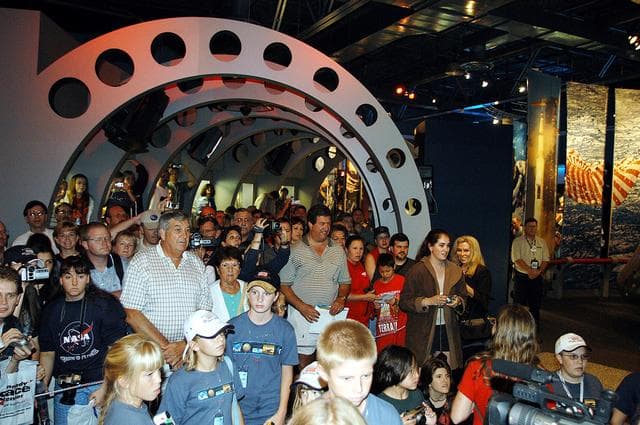 NASA image: KENNEDY SPACE CENTER, FLA. -  Hundreds of guests attend a ribbon cutting ceremony officially opening the U.S. Astronaut Hall of Fame as part of the Kennedy Space Center Visitor Complex. The ceremony was held in conjunction with the induction of four Space Shuttle astronauts into the Hall of Fame including Daniel Brandenstein, Robert "Hoot" Gibson, Story Musgrave, and Sally Ride. Conceived by six of the Mercury Program astronauts, the U.S. Astronaut Hall of Fame opened in 1990 to provide a place where space travelers could be remembered for their participation and accomplishments in the U.S. space program. The four new inductees join 48 previously honored astronauts from the ranks of the Gemini, Apollo, Skylab, Apollo-Soyuz, and Space Shuttle programs.
