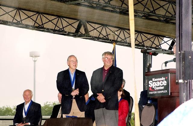 NASA image: KENNEDY SPACE CENTER, FLA. -  At the KSC Visitor Complex, former astronaut Daniel Brandenstein (standing right) is presented to the audience at his induction ceremony into the U.S. Astronaut Hall of Fame. Also standing is former astronaut James A. Lovell.  Seated on the dais, from left, are former astronauts John H. Glenn and Gordon Cooper, both previously inducted into the Hall of Fame. Being inducted with Brandenstein are Space Shuttle astronauts Robert "Hoot" Gibson, Story Musgrave, and Sally K. Ride. Conceived by six of the Mercury Program astronauts, the U.S. Astronaut Hall of Fame opened in 1990 to provide a place where space travelers could be remembered for their participation and accomplishments in the U.S. space program. The four new inductees join 48 previously honored astronauts from the ranks of the Gemini, Apollo, Skylab, Apollo-Soyuz, and Space Shuttle programs.