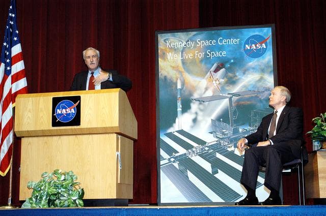 NASA image: KENNEDY SPACE CENTER, FLA. -  NASA Administrator Sean O'Keefe addresses a group of KSC employees assembled in the KSC Training Auditorium. KSC Director Roy D. Bridges (right) also spoke.  The occasion is the announcement of James W. Kennedy as the next director of the NASA Kennedy Space Center (KSC) in Florida. Kennedy has served as KSC's deputy director since November 2002. He will succeed Bridges, who was appointed on June 13 to lead NASA's Langley Research Center, Hampton, Va.