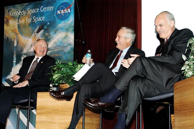 NASA image: KENNEDY SPACE CENTER, FLA. -  From left, KSC Director Roy D. Bridges, NASA Administrator Sean O'Keefe, and NASA Associate Administrator of Space Flight William F. Readdy share a light moment on the stage in the KSC Training Auditorium. The occasion is the announcement of James W. Kennedy as the next director of the NASA Kennedy Space Center (KSC) in Florida. Kennedy has served as KSC's deputy director since November 2002. He will succeed Bridges, who was appointed on June 13 to lead NASA's Langley Research Center, Hampton, Va.