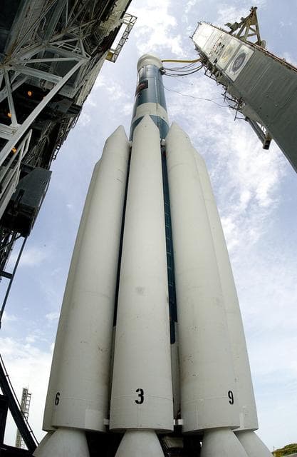 NASA image: KENNEDY SPACE CENTER, FLA. -  The Mobile Service Tower is rolled back at Space Launch Complex 17B, Cape Canaveral Air Force Station, to reveal the Delta II Heavy launch vehicle ready for launch of the Mars Exploration Rover-B (MER-B) mission, with the rover "Opportunity" aboard. The second of twin rovers being sent to Mars, it is equipped with a robotic arm, a drilling tool, three spectrometers, and four pairs of cameras that allow it to have a human-like, 3D view of the terrain. Each rover could travel as far as 100 meters in one day to act as Mars scientists' eyes and hands, exploring an environment where humans are not yet able to go. MER-B is scheduled to launch on June 28 at one of two available times, 11:56:16 p.m. EDT or 12:37:59 a.m. EDT on June 29.
