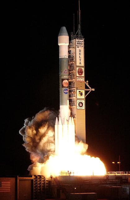 KENNEDY SPACE CENTER, FLA. - On Launch Complex 17-B, Cape Canaveral Air Force Station, the Delta II Heavy launch vehicle carrying the rover "Opportunity" for the second Mars Exploration Rover mission launches at 11:18:15 p.m. EDT.  Opportunity will reach Mars on Jan. 25, 2004. Together the two MER rovers, Spirit (launched June 10) and Opportunity, seek to determine the history of climate and water at two sites on Mars where conditions may once have been favorable to life. The rovers are identical. They will navigate themselves around obstacles as they drive across the Martian surface, traveling up to about 130 feet each Martian day.  Each rover carries five scientific instruments including a panoramic camera and microscope, plus a rock abrasion tool that will grind away the outer surfaces of rocks to expose their interiors for examination. Each rover’s prime mission is planned to last three months on Mars.