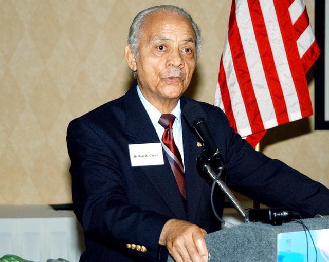 NASA image: KENNEDY SPACE CENTER, FLA. - Col. (Ret.) Herbert E. Carter, one of the Tuskegee Airmen, speaks to guests at a dinner sponsored by the KSC Spaceflight and Life Sciences Office.