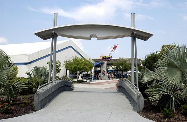NASA image: KENNEDY SPACE CENTER, FLA.  -  A popular exhibit at the KSC Visitor Complex, the Mad Mission to Mars 2025, seen beyond the crossover, is a live-action stage show that combines stereoscopic 3-D computer animation and spectacular theatrical effects.