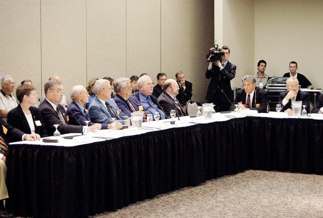 NASA image: KENNEDY SPACE CENTER, FLA.  - The Return To Flight Task Group (RTFTG) holds the first public meeting at the Debus Center, KSC Visitor Complex.  Shown at the table on the left are Dr. Amy K. Donahue, James D. Lloyd, Robert Sieck, retired Air Force Lt. Gen. Forrest C. McCartney, Richard Kohrs, Sy Rubenstein and Dr. Charles C. Daniel.  The group is co-chaired by former Shuttle commander Richard O. Covey and retired Air Force Lt. Gen. Thomas P. Stafford, who was an Apollo commander.   The RTFTG was at KSC to conduct organizational activities, tour Space Shuttle facilities and receive briefings on Shuttle-related topics.  The task group was chartered by NASA Administrator Sean O’Keefe to perform an independent assessment of NASA’s implementation of the final recommendations of the Columbia Accident Investigation Board.