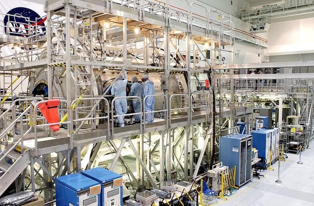 NASA image: KENNEDY SPACE CENTER, FLA.  - In the Space Station Processing Facility, work is ongoing on the U.S. Node 2, the second of three Space Station connecting modules.  The Italian-built Node 2 attaches to the end of the U.S. Lab and will provide attach locations for the Japanese laboratory, European laboratory, the Centrifuge Accommodation Module and, later, Multipurpose Logistics Modules. It will provide the primary docking location for the Shuttle when a pressurized mating adapter is attached to Node 2.  Installation of the module will complete the U.S. Core of the ISS.  Node 2 is the designated payload for mission STS-120.  No orbiter or launch date has been determined yet.