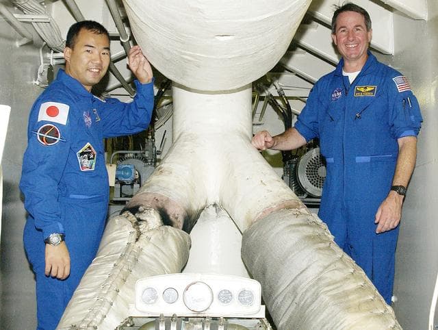 NASA image: KENNEDY SPACE CENTER, FLA. -  STS-114  Mission Specialists Soichi Noguchi and Stephen Robinson visit the engine room of the Liberty Star, one of two SRB Retrieval Ships.  Noguchi is with the Japanese space agency NASDA. Other crew members on the tour are Commander Eileen Collins and Pilot James Kelly.  On their mission, the crew will carry the MultiPurpose Logistics Module (MPLM) Raffaello and External Stowage Platform 2 to the International Space Station.  The MPLM will contain supplies and equipment.  Another goal of the mission is to remove and replace a Control Moment Gyro.  Launch date for mission STS-114 is under review.