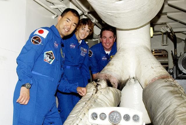 NASA image: KENNEDY SPACE CENTER, FLA. -   Visiting the engine room of the Liberty Star, one of two SRB Retrieval Ships, are STS-114 crew members Soichi Noguchi, mission specialist, Eileen Collins, commander, and Stephen Robinson, mission specialist.  Noguchi is with the Japanese space agency NASDA. Not pictured is Pilot James Kelly.   On their mission, the crew will carry the MultiPurpose Logistics Module (MPLM) Raffaello and External Stowage Platform 2 to the International Space Station.  The MPLM will contain supplies and equipment.  Another goal of the mission is to remove and replace a Control Moment Gyro.  Launch date for mission STS-114 is under review.