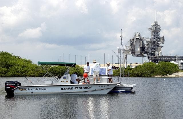 NASA image: KENNEDY SPACE CENTER, FLA.  -  Researchers utilize several types of watercraft to conduct underwater acoustic research in the Launch Complex 39 turn basin near Launch Pad 39A.  Several government agencies, including NASA, NOAA, the Navy, the Coast Guard, and the Florida Fish and Wildlife Commission are involved in the testing. The research involves demonstrations of passive and active sensor technologies, with applications in fields ranging from marine biological research to homeland security. The work is also serving as a pilot project to assess the cooperation between the agencies involved. Equipment under development includes a passive acoustic monitor developed by NASA’s Jet Propulsion Laboratory, and mobile robotic sensors from the Navy’s Mobile Diving and Salvage Unit.