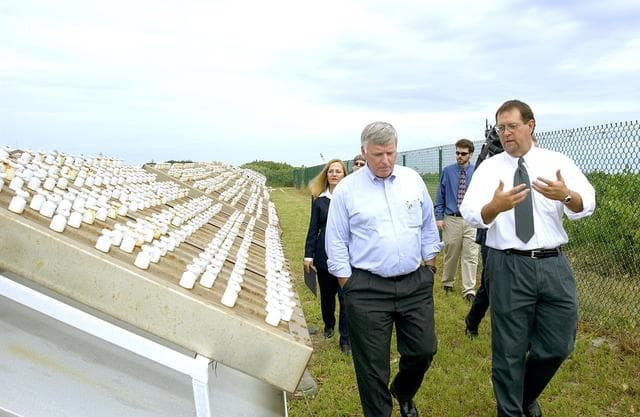 NASA image: KENNEDY SPACE CENTER, FLA. -   On a tour of the KSC Beach Corrosion Test Site, Louis MacDowell (right), Testbed manager, explains to Center Director Jim Kennedy a project being undertaken for the U.S. Navy.  At left are nonchrome primers for aircraft being studied.  Behind Kennedy is Lead Scientist Dr. Luz Marina Calle.  Behind MacDowell is Dr. Paul Hintze, who is working on a graduate project for the National Research Council.  The KSC Beach Corrosion Test Site was established in the 1960s and has provided more than 30 years of historical information on the long-term performance of many materials in use at KSC and other locations around the world. Located 100 feet from the Atlantic Ocean approximately 1 mile south of the Space Shuttle launch sites, the test facility includes an atmospheric exposure site, a flowing seawater exposure site, and an on-site electrochemistry laboratory and monitoring station. The beach laboratory is used to conduct real-time corrosion experiments and provides for the remote monitoring of surrounding weather conditions. The newly added flowing seawater immersion facility provides for the immersion testing of materials and devices under controlled conditions.