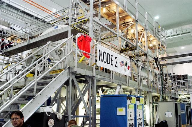 NASA image: KENNEDY SPACE CENTER, FLA. - The  U.S. Node 2 is undergoing a Multi-Element Integrated Test (MEIT) in the Space Station Processing Facility.  Node 2 attaches to the end of the U.S. Lab on the ISS and provides attach locations for the Japanese laboratory, European laboratory, the Centrifuge Accommodation Module and, eventually, Multipurpose Logistics Modules. It will provide the primary docking location for the Shuttle when a pressurized mating adapter is attached to Node 2.  Installation of the module will complete the U.S. Core of the ISS.