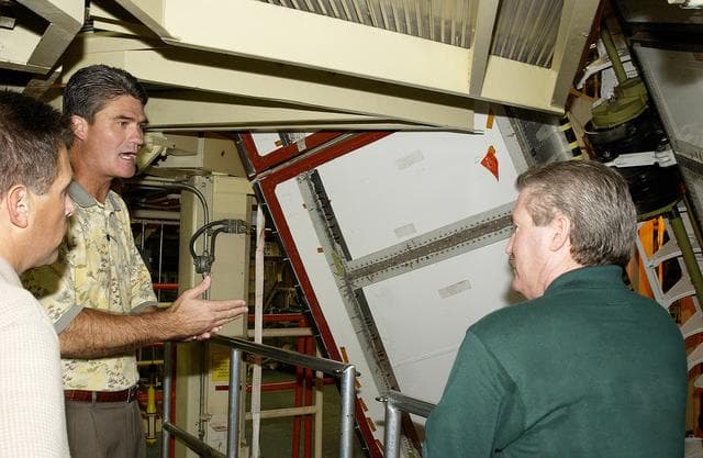 NASA image: Bill Parsons with Discovery Processing Team