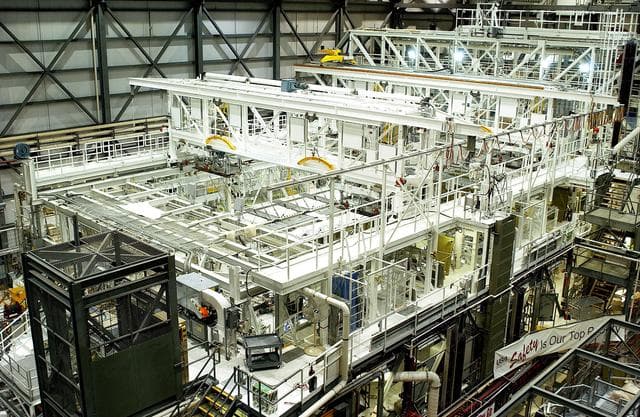 NASA image: KENNEDY SPACE CENTER, FLA. -   Workstands at various levels surround the orbiter Endeavour in the Orbiter Processing Facility (OPF).  The OPF provides postflight servicing and checkout, as well as vehicle modifications.