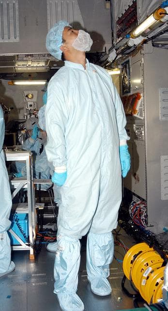 NASA image: KENNEDY SPACE CENTER, FLA. -   Astronaut Soichi Noguchi, with the National Space Development Agency of Japan (NASDA), is inside the Japanese Experiment Module (JEM), undergoing a Multi-Element Integrated Test (MEIT)  in the Space Station Processing Facility.  Noguchi is assigned to mission STS-114 as a mission specialist.   Node 2 attaches to the end of the U.S. Lab on the ISS and provides attach locations for the Japanese laboratory, European laboratory, the Centrifuge Accommodation Module and, eventually, Multipurpose Logistics Modules. It will provide the primary docking location for the Shuttle when a pressurized mating adapter is attached to Node 2.  Installation of the module will complete the U.S. Core of the ISS.   The JEM, developed by NASDA,  is Japan's primary contribution to the Station. It will enhance the unique research capabilities of the orbiting complex by providing an additional environment for astronauts to conduct science experiments.