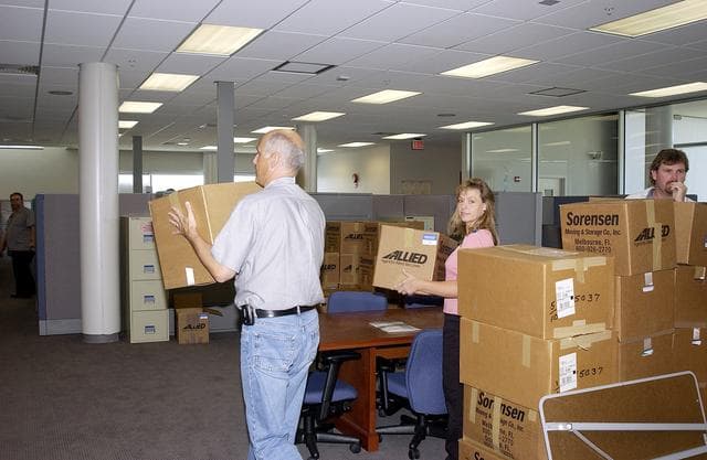 NASA image: KENNEDY SPACE CENTER, FLA. -  Ivan Rodriguez, with Bionetics, and Michelle Crouch and Larry Burns, with Dynamac, carry boxes of equipment into the Space Life Sciences Lab (SLSL), formerly known as the Space Experiment Research and Processing Laboratory (SERPL).    They are transferring equipment from Hangar L. The new lab is a state-of-the-art facility being built for ISS biotechnology research. Developed as a partnership between NASA-KSC and the State of Florida, NASA’s life sciences contractor will be the primary tenant of the facility, leasing space to conduct flight experiment processing and NASA-sponsored research. About 20 percent of the facility will be available for use by Florida’s university researchers through the Florida Space Research Institute.