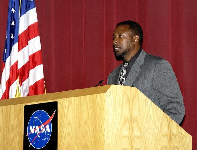 NASA image: KENNEDY SPACE CENTER, FLA. -  Dr. Woodrow Whitlow Jr., KSC deputy director, speaks to employees during  Center Director Jim Kennedy’s first all-hands meeting for employees.  Also on the agenda was Tim Wilson, assistant chief engineer for Shuttle, and Bill Pickavance, vice president and deputy program manager, Florida operations, United Space Alliance..  Representatives from the Shuttle program and contractor team were on hand to discuss the Columbia Accident Investigation Board report and where KSC stands in its progress toward return to flight.