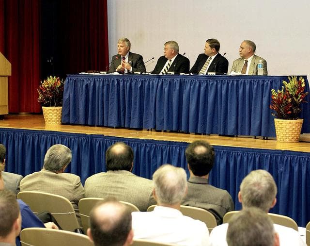 NASA image: KENNEDY SPACE CENTER, FLA. -  Representatives from the Shuttle program and contractor team are part of Center Director Jim Kennedy’s first all-hands meeting for employees. From left are Kennedy, Bill Pickavance, Mike Wetmore and Bert Garrido.   They were on hand to discuss the Columbia Accident Investigation Board report and where KSC stands in its progress toward return to flight.