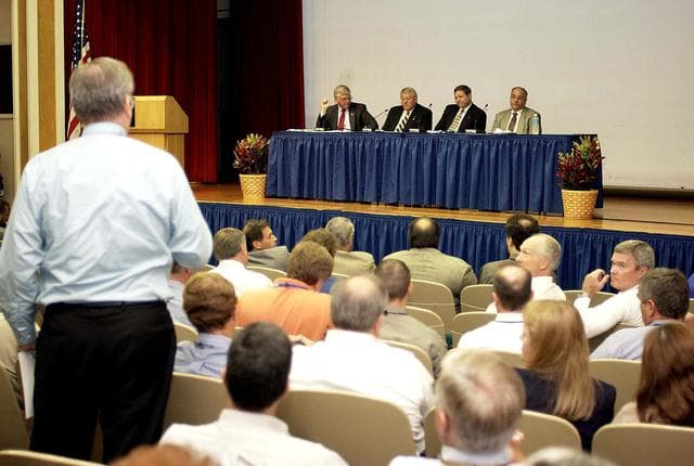 NASA image: KENNEDY SPACE CENTER, FLA. -  Representatives from the Shuttle program and contractor team are part of Center Director Jim Kennedy’s first all-hands meeting for employees. From left are Kennedy, Bill Pickavance, Mike Wetmore and Bert Garrido.   They were on hand to discuss the Columbia Accident Investigation Board report and where KSC stands in its progress toward return to flight.