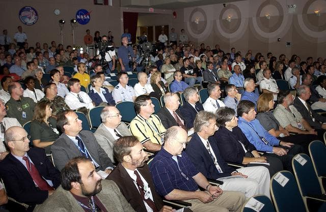 NASA image: KENNEDY SPACE CENTER, FLA. -  Employees fill the Training Auditorium for the kickoff presentation for Spaceport Super Safety and Health Day. Along with Center Director Jim Kennedy, guest speakers were Brig. Gen. J. Gregory Pavlovich, 45th Space Wing, Maj. Gen. Kevin Chilton, and Capt. Charles Plumb (USNR retired), who spoke about his experiences in the Navy and as a prisoner of war in Vietnam.  Spaceport Super Safety and Health Day is an annual event at KSC and Cape Canaveral Air Force Station dedicated to reinforcing safe and healthful behaviors in the workforce.  Safety Awards were also given to individuals and groups.