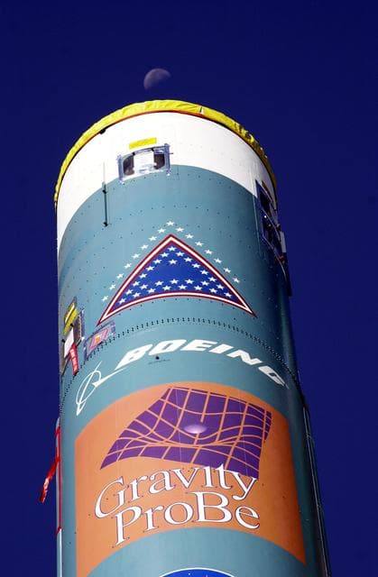 NASA image: VANDENBERG AFB, CALIF. -  Logos identify the mission of this Delta II rocket that will launch the Gravity Probe B experiment, developed by Stanford University, Lockheed Martin and NASA’s Marshall Space Flight Center.   The Gravity Probe B will launch a payload of four gyroscopes into low-Earth polar orbit to test two extraordinary predictions of Albert Einstein’s general theory of relativity: the geodetic effect (how space and time are warped by the presence of the Earth) and frame dragging (how Earth’s rotation drags space and time around with it). Once in orbit, for 18 months each gyroscope’s spin axis will be monitored as it travels through local spacetime, observing and measuring these effects. The targeted launch date is Dec. 6, 2003.