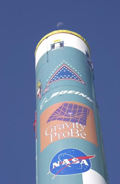 NASA image: VANDENBERG AFB, CALIF. -  Logos identify the mission of this Delta II rocket that will launch the Gravity Probe B experiment, developed by Stanford University, Lockheed Martin and NASA’s Marshall Space Flight Center.   The Gravity Probe B will launch a payload of four gyroscopes into low-Earth polar orbit to test two extraordinary predictions of Albert Einstein’s general theory of relativity: the geodetic effect (how space and time are warped by the presence of the Earth) and frame dragging (how Earth’s rotation drags space and time around with it). Once in orbit, for 18 months each gyroscope’s spin axis will be monitored as it travels through local spacetime, observing and measuring these effects. The targeted launch date is Dec. 6, 2003.