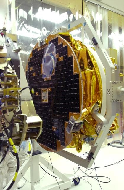 NASA image: VANDENBERG AIR FORCE BASE, CALIF. -  At Vandenberg AFB, Calif., a solar array is tested before installing on the SciSat-1 spacecraft.  The SciSat-1 weighs approximately 330 pounds and after launch will be placed in a 400-mile-high polar orbit to investigate processes that control the distribution of ozone in the upper atmosphere. The data from the satellite will provide Canadian and international scientists with improved measurements relating to global ozone processes and help policymakers assess existing environmental policy and develop protective measures for improving the health of our atmosphere, preventing further ozone depletion. The mission is designed to last two years.