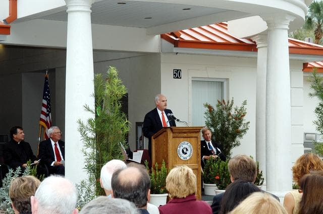 NASA image: KENNEDY SPACE CENTER, FLA. -- NASA Associate Administrator for Space Flight William F. Readdy addresses the family members of the STS-107 astronauts, other dignitaries, members of the university community and the public gathered for the dedication ceremony of the Columbia Village at the Florida Institute of Technology in Melbourne, Fla.  Each of the seven new residence halls in the complex is named for one of the STS-107 astronauts who perished during the Columbia accident -- Rick Husband, Willie McCool, Laurel Clark, Michael Anderson, David Brown, Kalpana Chawla, and Ilan Ramon.