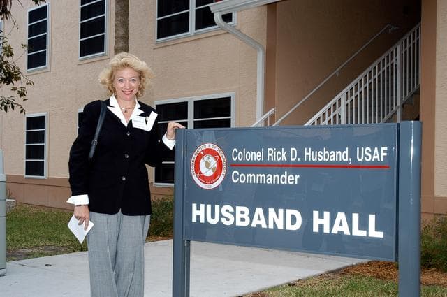 NASA image: KENNEDY SPACE CENTER, FLA. -- Evelyn Husband, wife of STS-107 Commander Rick Husband, visits a new residence hall at the Florida Institute of Technology (FIT) in Melbourne, Fla., named for her late husband.  Family members of the STS-107 astronauts, other dignitaries, members of the university community and the public gathered for a dedication ceremony for the Columbia Village at FIT.  Each of the seven new residence halls in the complex is named for one of the STS-107 astronauts who perished during the Columbia accident -- Rick Husband, Willie McCool, Laurel Clark, Michael Anderson, David Brown, Kalpana Chawla, and Ilan Ramon.
