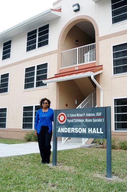 NASA image: KENNEDY SPACE CENTER, FLA. -- Sandra Anderson, wife of STS-107 Payload Commander Michael Anderson, visits a new residence hall at the Florida Institute of Technology (FIT) in Melbourne, Fla., named for her late husband.  Family members of the STS-107 astronauts, other dignitaries, members of the university community and the public gathered for a dedication ceremony for the Columbia Village at FIT.  Each of the seven new residence halls in the complex is named for one of the STS-107 astronauts who perished during the Columbia accident -- Rick Husband, Willie McCool, Laurel Clark, Michael Anderson, David Brown, Kalpana Chawla, and Ilan Ramon.