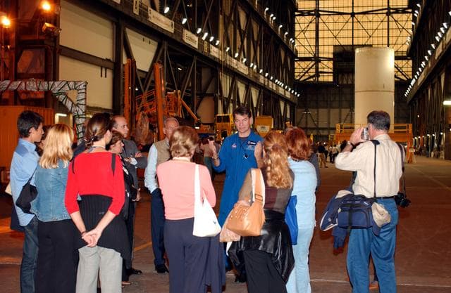 NASA image: KENNEDY SPACE CENTER, FLA. - Members of the North American Treaty Organization (NATO) Parliamentary Assembly visit the Vehicle Assembly Building during their tour of KSC. They are listening to comments from Italian astronaut Paolo Angelo Nespoli, who is with the European Space Agency.  The members are meeting in Orlando this year for their 49th annual gathering.  They chose to visit KSC with their families during their one-day excursion break from meetings.