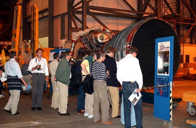 NASA image: KENNEDY SPACE CENTER, FLA. - Members of the North American Treaty Organization (NATO) Parliamentary Assembly  get a close look at a Space Shuttle main engine in the Vehicle Assembly Building during their tour of KSC.   The Parliamentarians are meeting in Orlando this year for their 49th annual gathering.  They chose to visit KSC with their families during their one-day excursion break from meetings.