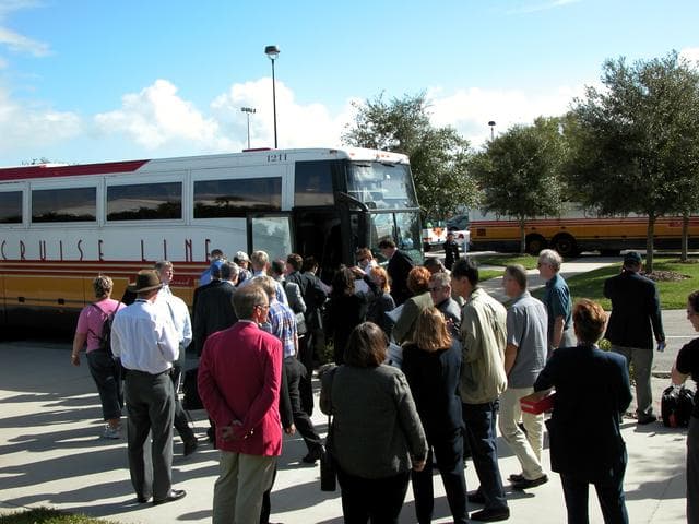 NASA image: KENNEDY SPACE CENTER, FLA. - After their tour of KSC, members of the North American Treaty Organization (NATO) Parliamentary Assembly board their tour bus to return to Orlando.   The Parliamentarians are meeting in Orlando this year for their 49th annual gathering.  They chose to visit KSC with their families during their one-day excursion break from meetings.