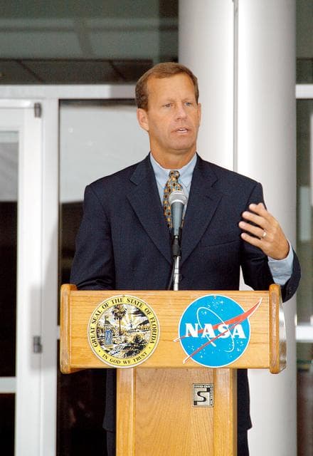 NASA image: KENNEDY SPACE CENTER, FLA. -  Frank T. Brogan, president of the Florida Atlantic University, speaks at a dedication and ribbon-cutting ceremony for the Space Life Sciences Lab hosted by NASA-Kennedy Space Center and the state of Florida at the new lab. Completed in August, the facility encompasses more than 100,000 square feet and was formerly known as the Space Experiment Research and Processing Laboratory or SERPL. The state, through the Florida Space Authority, built the research lab which is host to NASA, NASA’s Life Sciences Services contractor Dynamac Corp., Bionetics Corp., and researchers from the University of Florida.  Dynamac Corp. leases the facility.  The Florida Space Research Institute is responsible for gaining additional tenants from outside the NASA community.