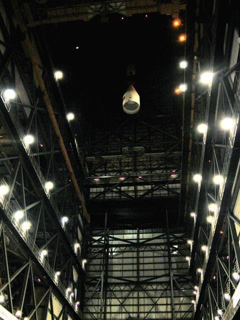 NASA image: KENNEDY SPACE CENTER, FLA. -  In the Vehicle Assembly Building, after being removed from the solid rocket booster (SRB), the forward assembly is lowered from high above the transfer aisle.  The destacking is part of time and cycle activities.  The SRB was part of the stack on Atlantis originally scheduled for a March 1, 2003, launch on mission STS-114.  The SRBs and external tank were demated in February 2003.   The mission is now scheduled to occur no earlier than Sept. 12, 2004, on Atlantis.