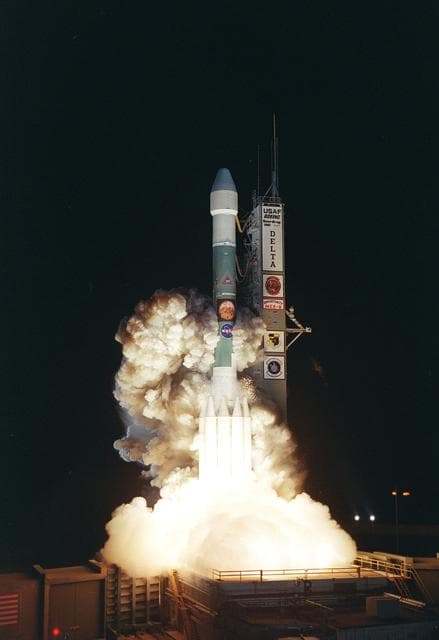 NASA image: KENNEDY SPACE CENTER, FLA. - From a burst of fire and smoke, the Delta II launch vehicle races into the sky carrying the second Mars Exploration Rover, Opportunity.  The bright glare briefly illuminated Florida Space Coast beaches.  Opportunity’s dash to Mars began with liftoff at 11:18:15 p.m. Eastern Daylight Time from Cape Canaveral Air Force Station, Fla.   The spacecraft separated successfully from the Delta's third stage 83 minutes later, after it had been boosted out of Earth orbit and onto a course toward Mars.