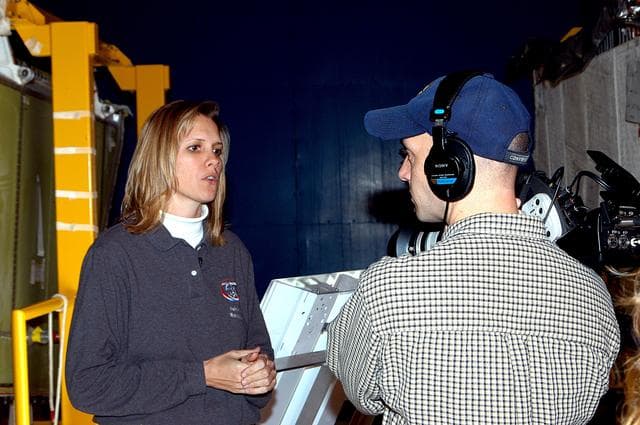 NASA image: KENNEDY SPACE CENTER, FLA. -  Stephanie Stilson, NASA vehicle manager for Discovery, is being filmed for a special feature on the KSC Web about the recent Orbiter Major Modification period, which included inspection, modifications and reservicing of most systems onboard Discovery, plus installation of a Multifunction Electronic Display Subsystem (MEDS) - a state-of-the-art “glass cockpit.”  The orbiter is now being prepared for eventual launch on a future mission.