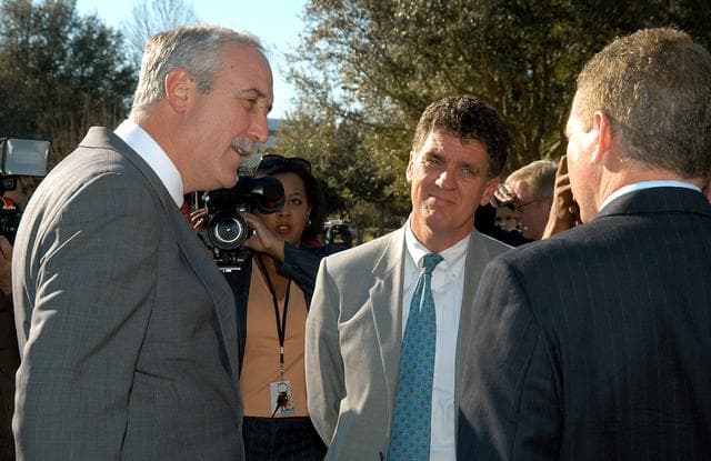 NASA image: KENNEDY SPACE CENTER, FLA. - After talking to the media, NASA Administrator Sean O’Keefe (left) speaks to Congressman Dave Weldon (center) and Florida Congressman Tom Feeney (right).  O’Keefe and government officials were at the park for a presentation about the assets of the research park as the site of NASA’s new Shared Services Center. Six sites around the U.S. are under consideration for location of the Center, which would centralize NASA’s payroll, accounting, human resources, facilities and procurement offices that are now handled at each field center.  The consolidation is part of the One NASA focus.  Others attending the presentation included  U.S. Senator Bill Nelson, U.S. Representative Ric Keller, Center Director Jim Kennedy and Pamella J. Dana, Ph.D., director, Office of Tourism, Trade, and Economic Development in Florida.