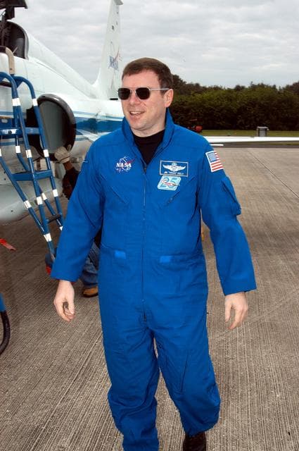 NASA image: KENNEDY SPACE CENTER, FLA. - STS-114 Pilot Jim Kelly is pleased to be back at KSC after arriving aboard a T-38 jet aircraft.  He and other crew members are at the Center for familiarization activities with equipment.   The mission is Logistics Flight 1, scheduled to deliver the Multi-Purpose Logistics Module carrying supplies and equipment to the Space Station and the external stowage platform.