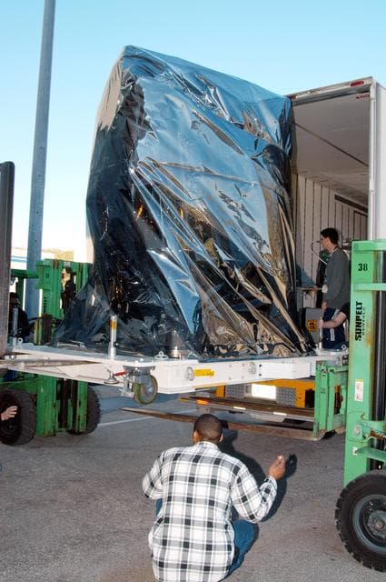 NASA image: KENNEDY SPACE CENTER, FLA. -  At the Astrotech Space Operations processing facilities near KSC, a lift helps offload NASA’s MESSENGER spacecraft shipped from NASA’s Goddard Space Flight Center in Greenbelt, Md.  MESSENGER - short for MErcury Surface, Space ENvironment, GEochemistry and Ranging - will be taken into a high bay clean room and employees of the Johns Hopkins University Applied Physics Laboratory, builders of the spacecraft, will perform an initial state-of-health check.  Then processing for launch can begin, including checkout of the power systems, communications systems and control systems.  The thermal blankets will also be attached for flight.  MESSENGER will be launched May 11 on a six-year mission aboard a Boeing Delta II rocket.  Liftoff is targeted for 2:26 a.m. EDT on Tuesday, May 11.