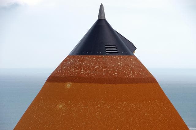NASA image: The External Tank attached to Space Shuttle Atlantis shows Hail 