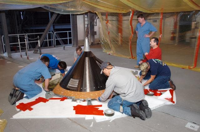 NASA image: Repairing the damage to Atlantis' External Tank