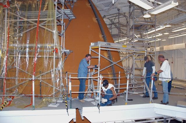 NASA image: Repairing the damage to Atlantis' External Tank