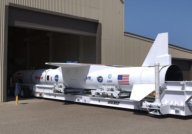 NASA image: The mated Pegasus XL rocket - AIM spacecraft leaves Building 165