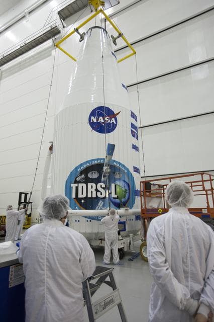 NASA image: TDRS-L Spacecraft is Lifted Onto Transporter