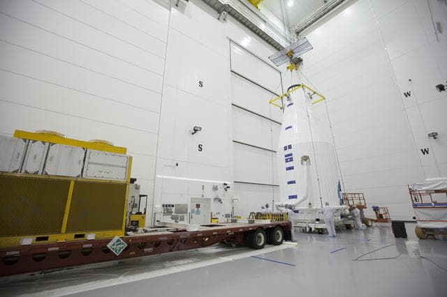 NASA image: TDRS-L Spacecraft is Lifted Onto Transporter