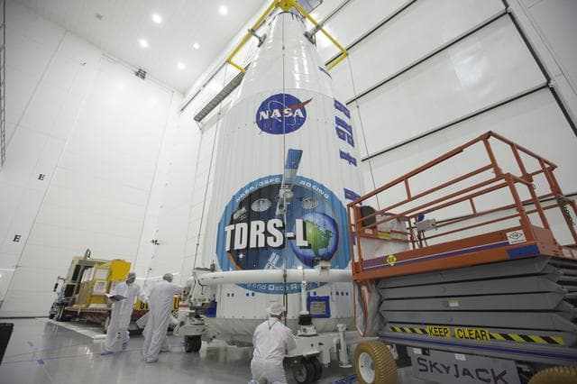 NASA image: TDRS-L Spacecraft is Lifted Onto Transporter