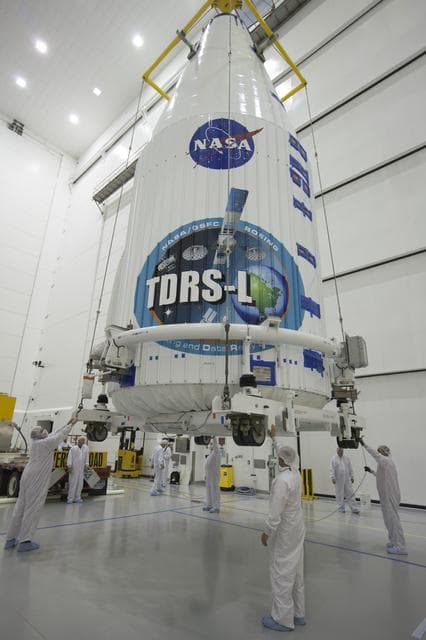 NASA image: TDRS-L Spacecraft is Lifted Onto Transporter